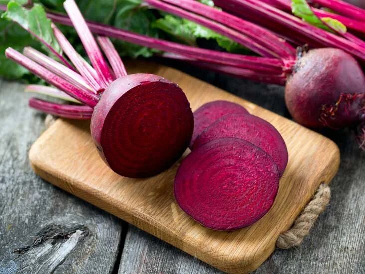 Fresh beetroot on a wooden board